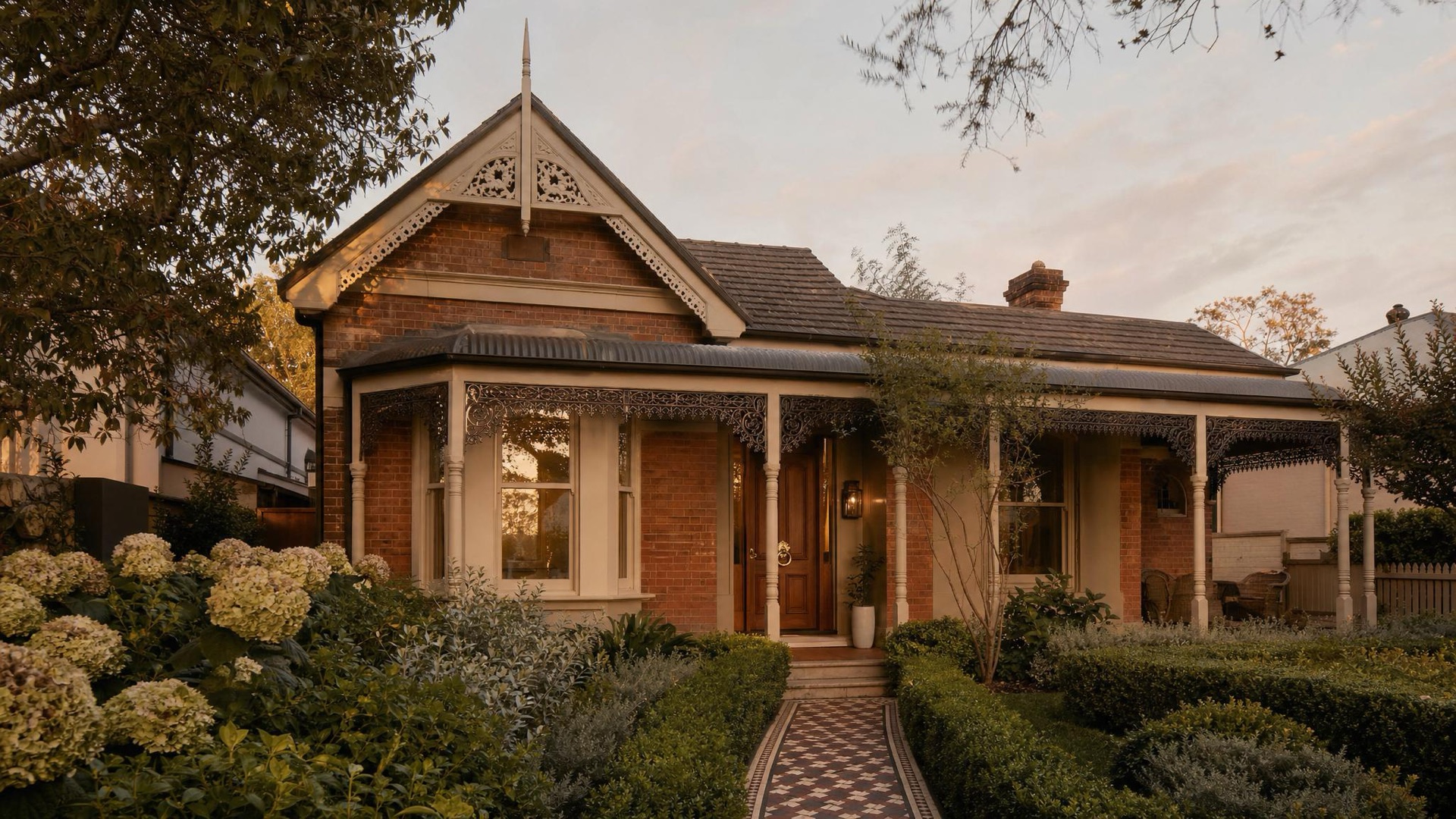 A restored period home streetscape with a decorative verandah and tuckpointed brick — illustrative concept, standing in for a confirmed Inner West terrace asset