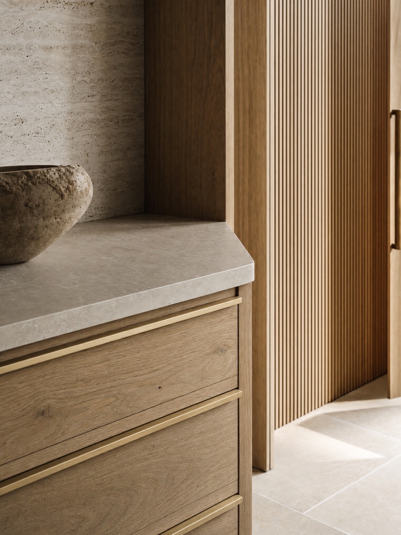 Custom aged-oak cabinetry with brushed-brass hardware — Panadium detail work